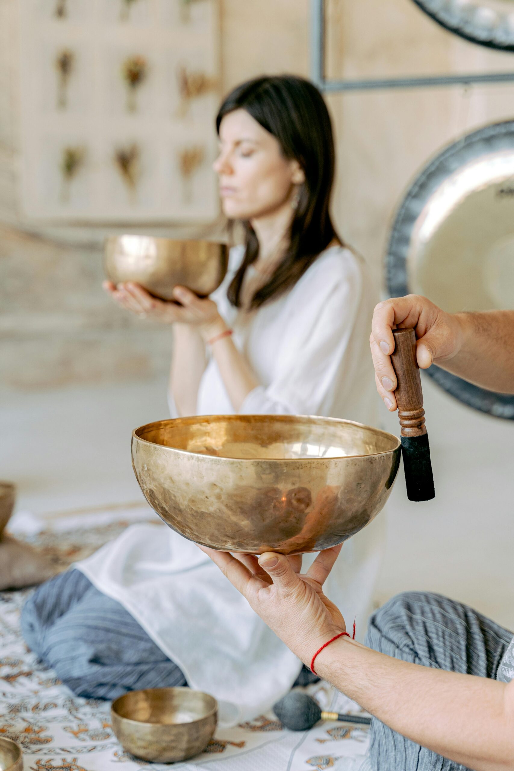 pexels-photo-6252095-6252095 A serene meditation session with singing bowls, promoting peace and healing.